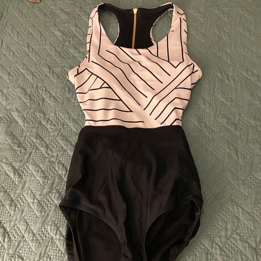 Albion Fit one piece geometric style